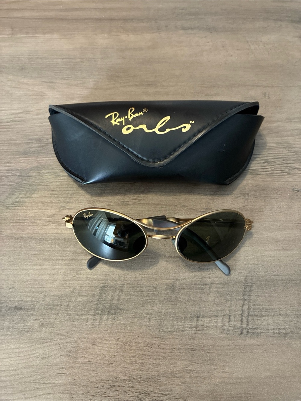 Ray-Ban Gold Frame Sunglasses with Dark Green Lenses